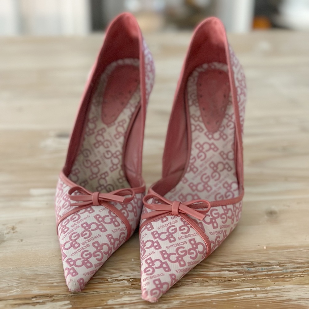 BCBG women’s heels.  Pink and white logo fabric. Pointed toe 3” heel.